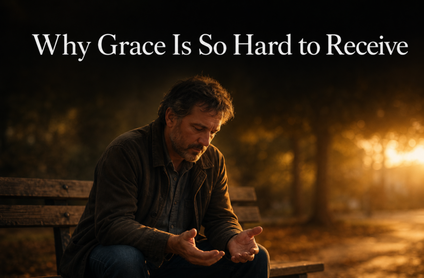Why Grace Is So Hard to Receive — a man sits on a park bench, head bowed, hands